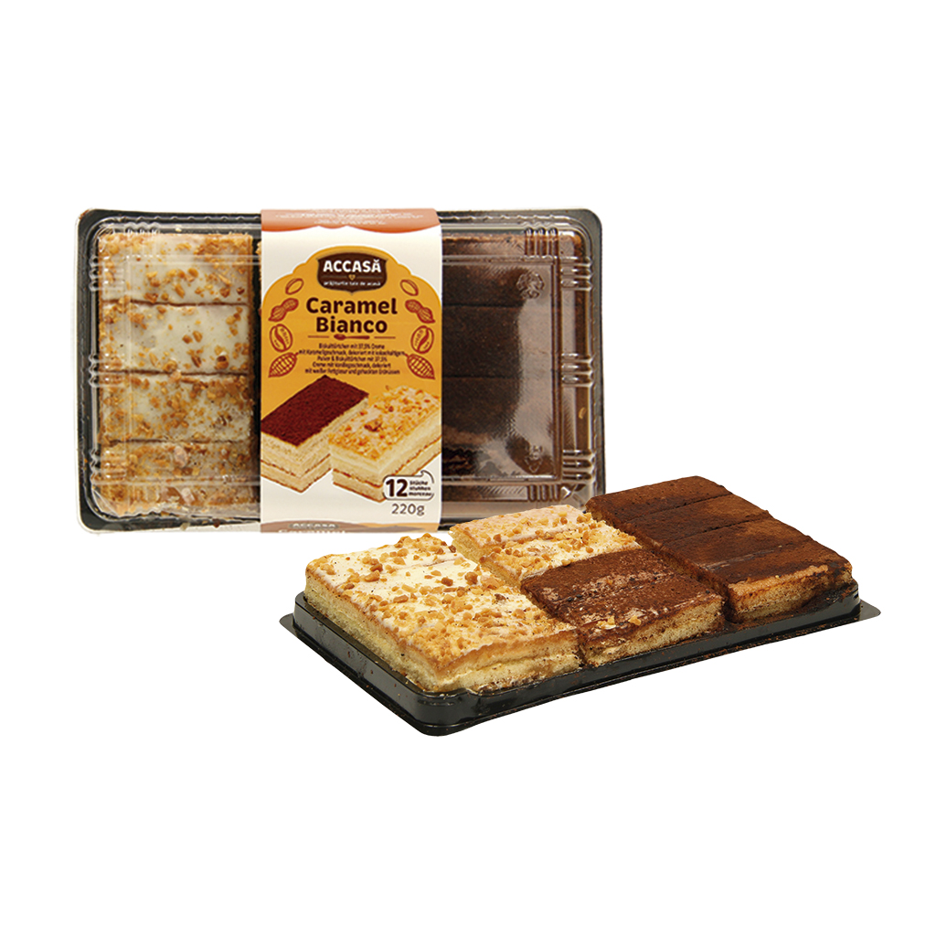 Biskuittörtjes met 37,5% crème met karamel smaak, versierd met cacaopoeder & Biskuittörtjes met 37,5% crème met vanille smaak, versierd met witte vetglazuur en gehakte pinda's