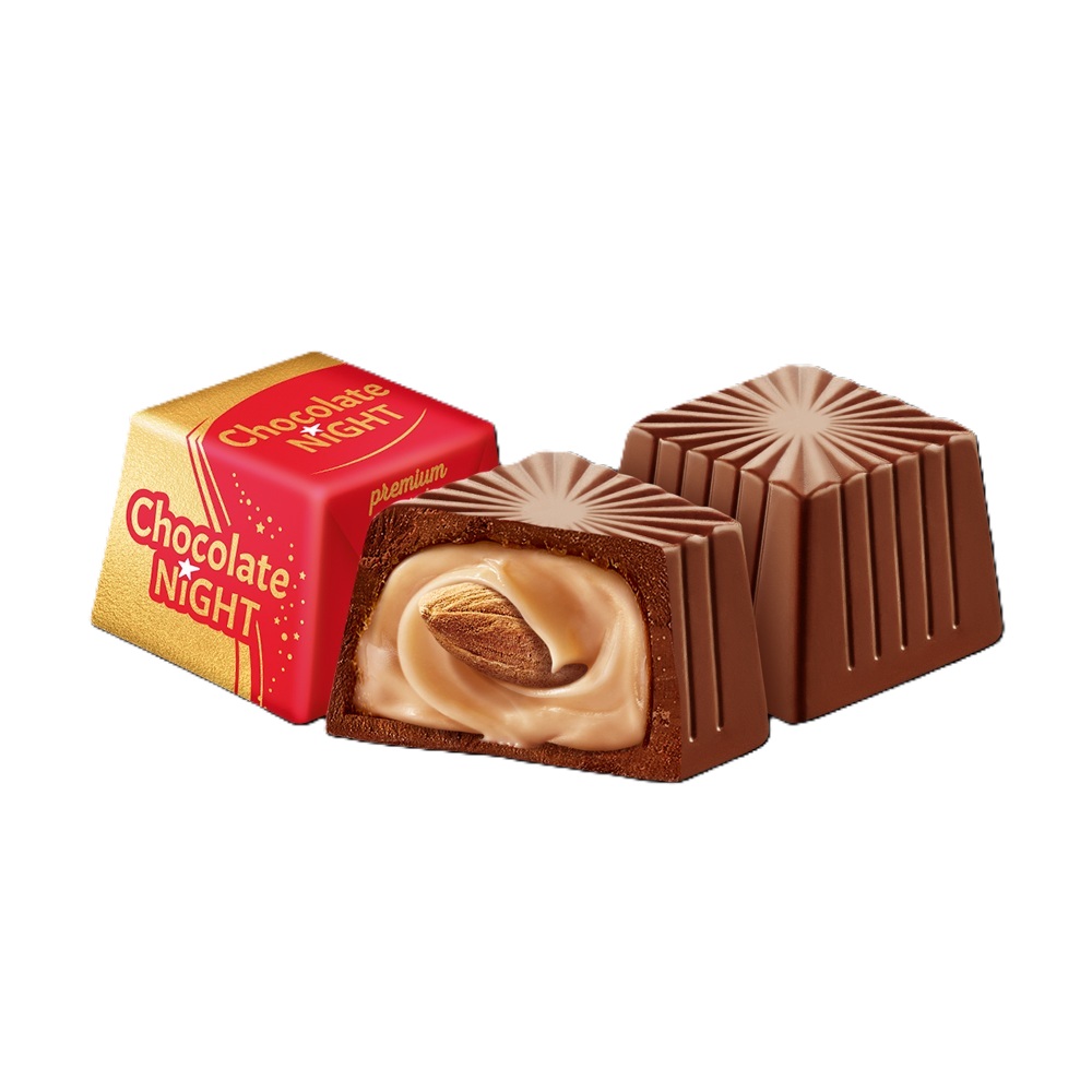 AVK "Chocolate night Milk" Melkchocolade Pralines met amandelvulling (43,3%) en hele amandel. Melkchocolade bevat naast cacaoboter ook andere plantaardige vetten. Cacao: minimaal 36%.
